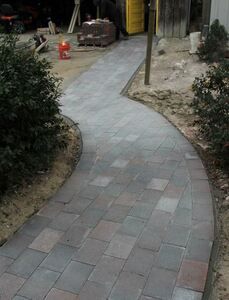 Completed installation of WarmlyYours snow melting system for heated wheelchair ramp.
