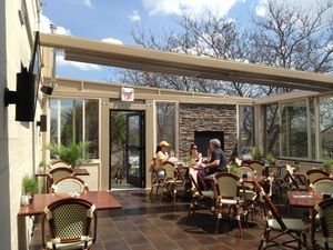 The retractable glass roof created a beautiful indoor-outdoor dining area, but heat loss is a real problem. The WarmlyYours TempZone floor heating system helps keep the room warm year-round.