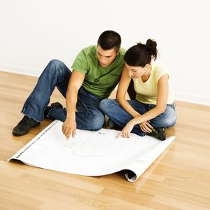 Couple reviewing their remodeling blueprints