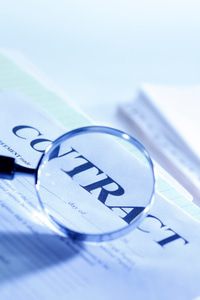 Contract under magnifying glass