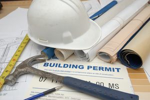 Building permit and materials for new home construction
